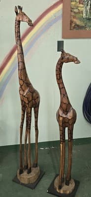These hand-carved Olivewood Giraffes from Zimbabwe celebrate the Shona folklore