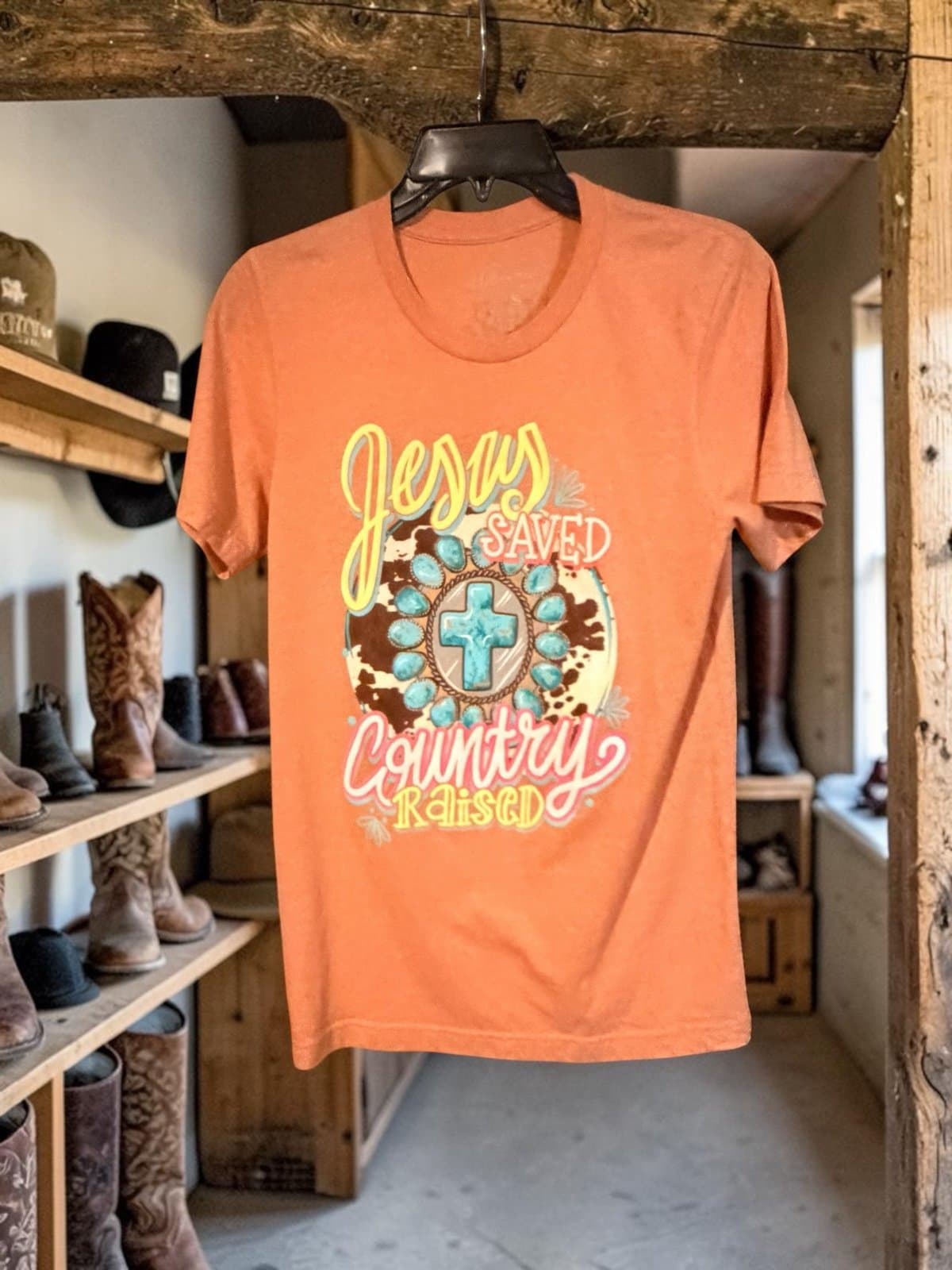 Lulu Mac tee—size small, brand new, “Jesus saved and country raised.”