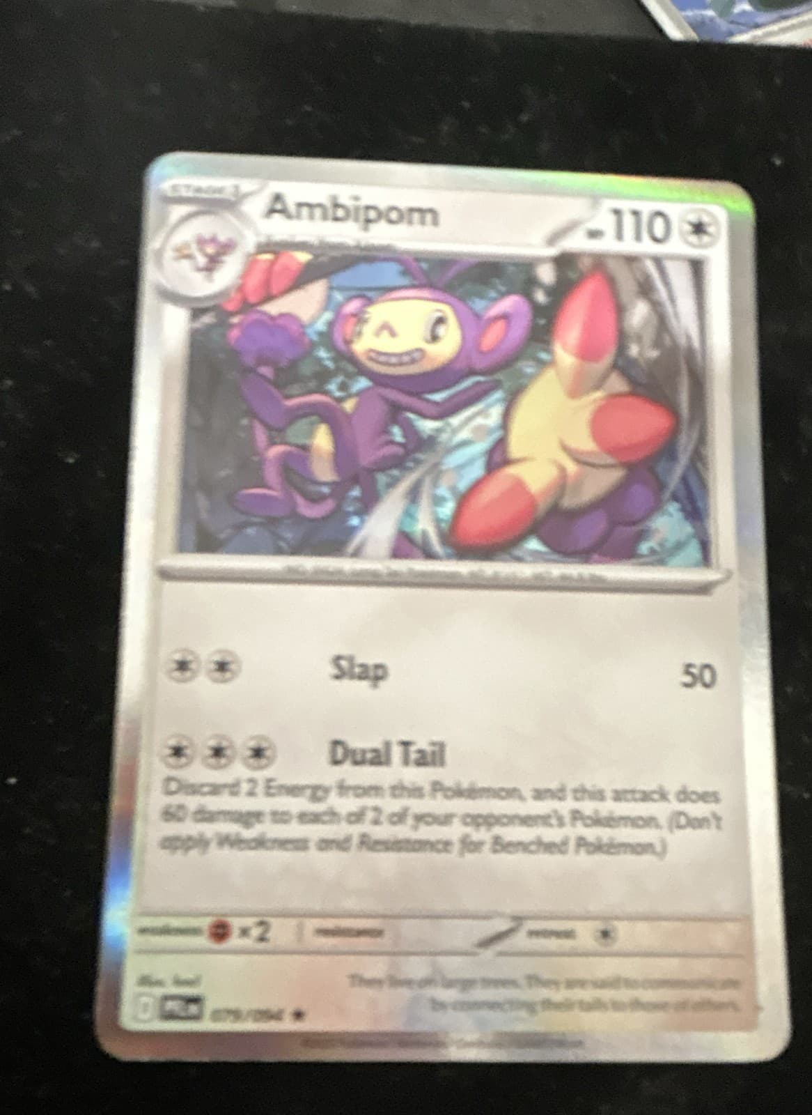 Ambipom 079/094 Me02: Phantasmal Flames Holo