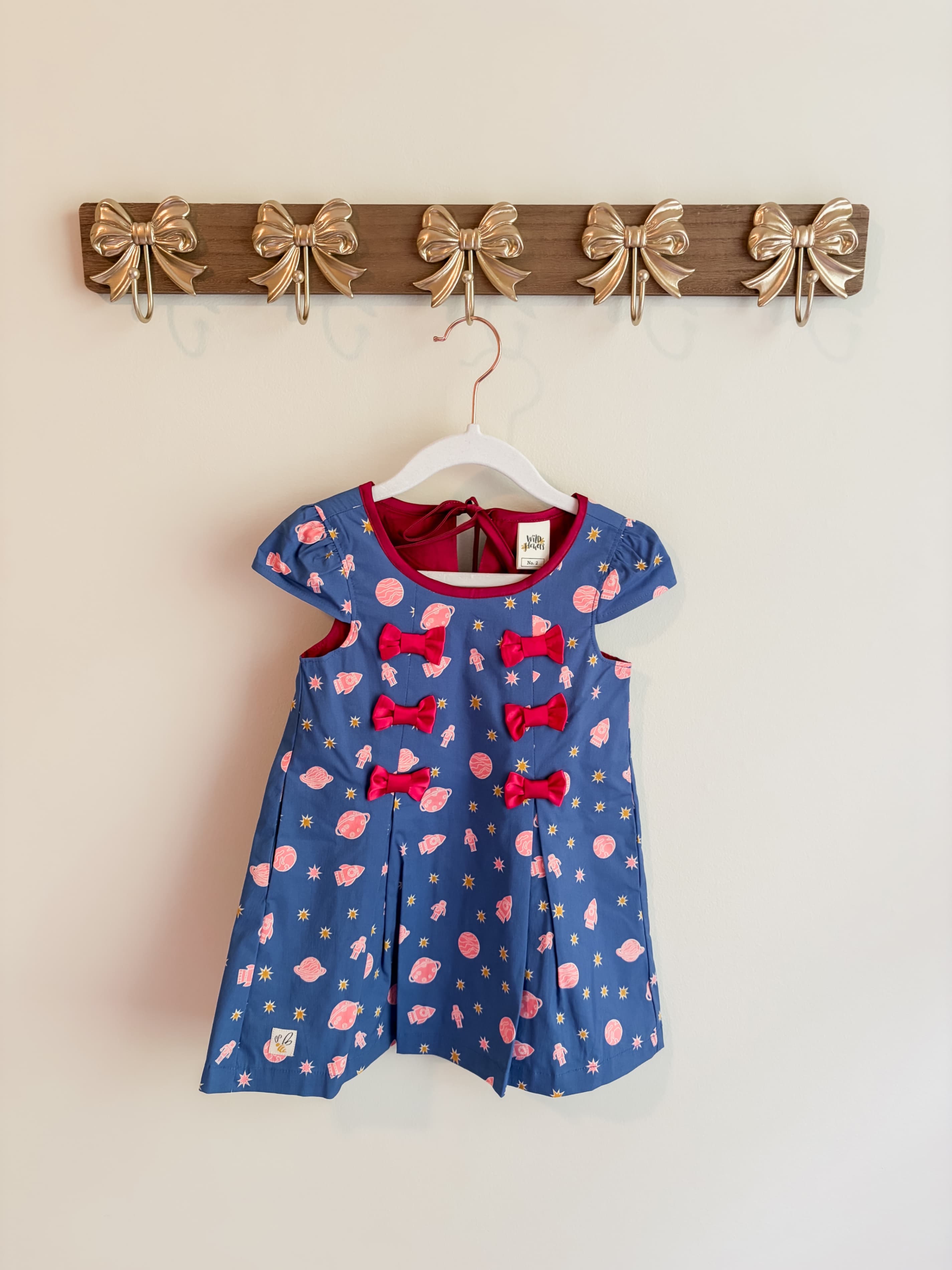 Wild Flowers Girls size 2 Blue Space Print Dress with Bows