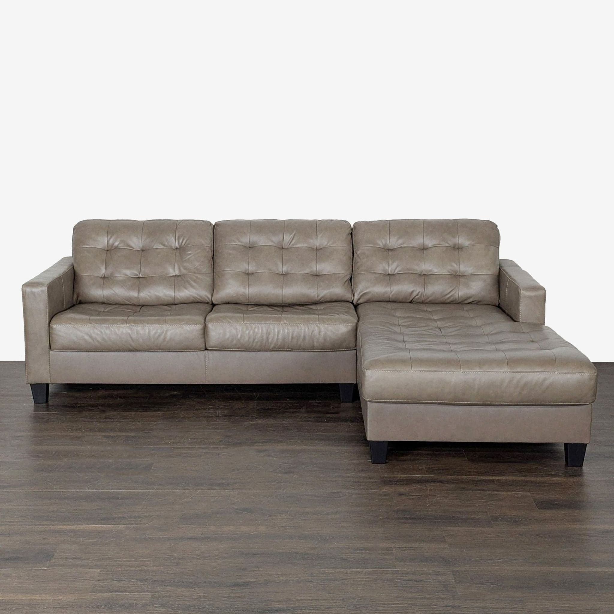 Ashley Furniture RAF Tufted Faux Leather Sectional with Chaise - Taupe