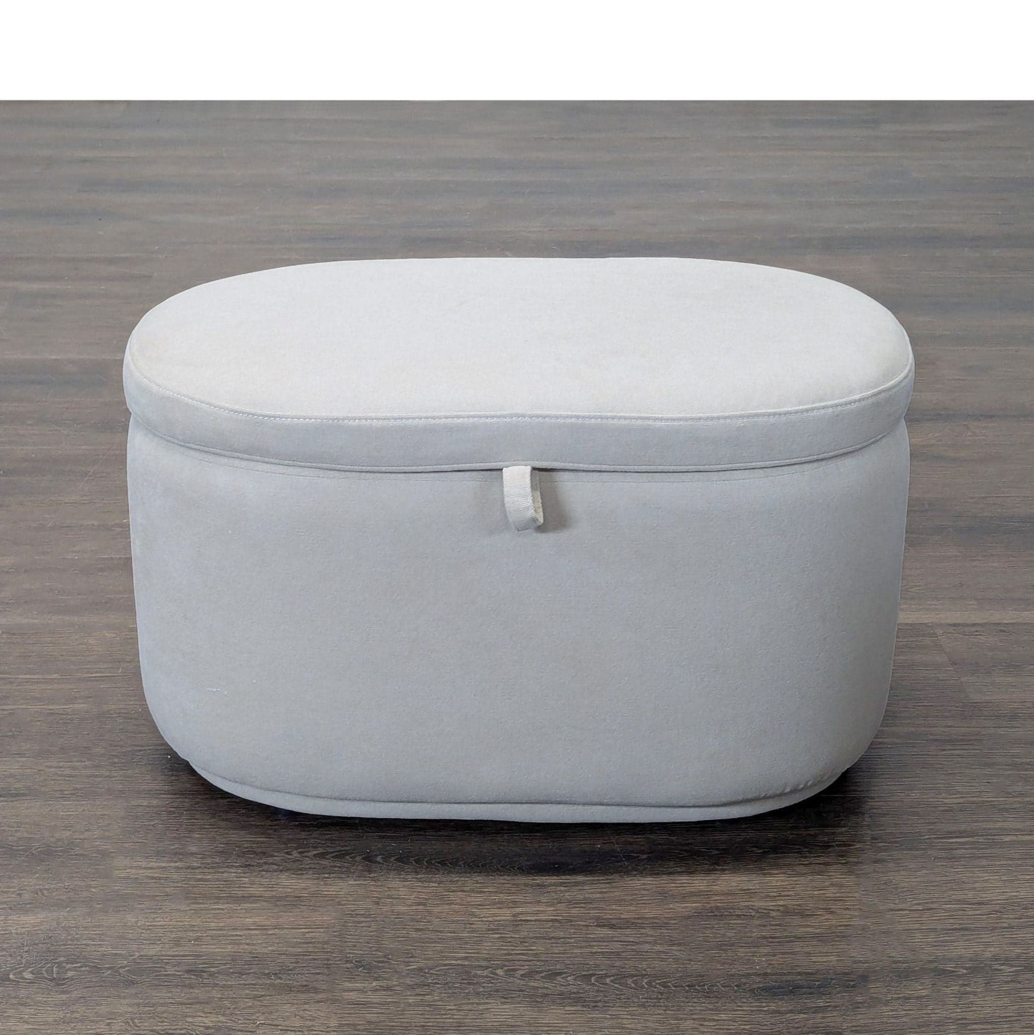 Nurture & Upholstered Oval Storage Ottoman