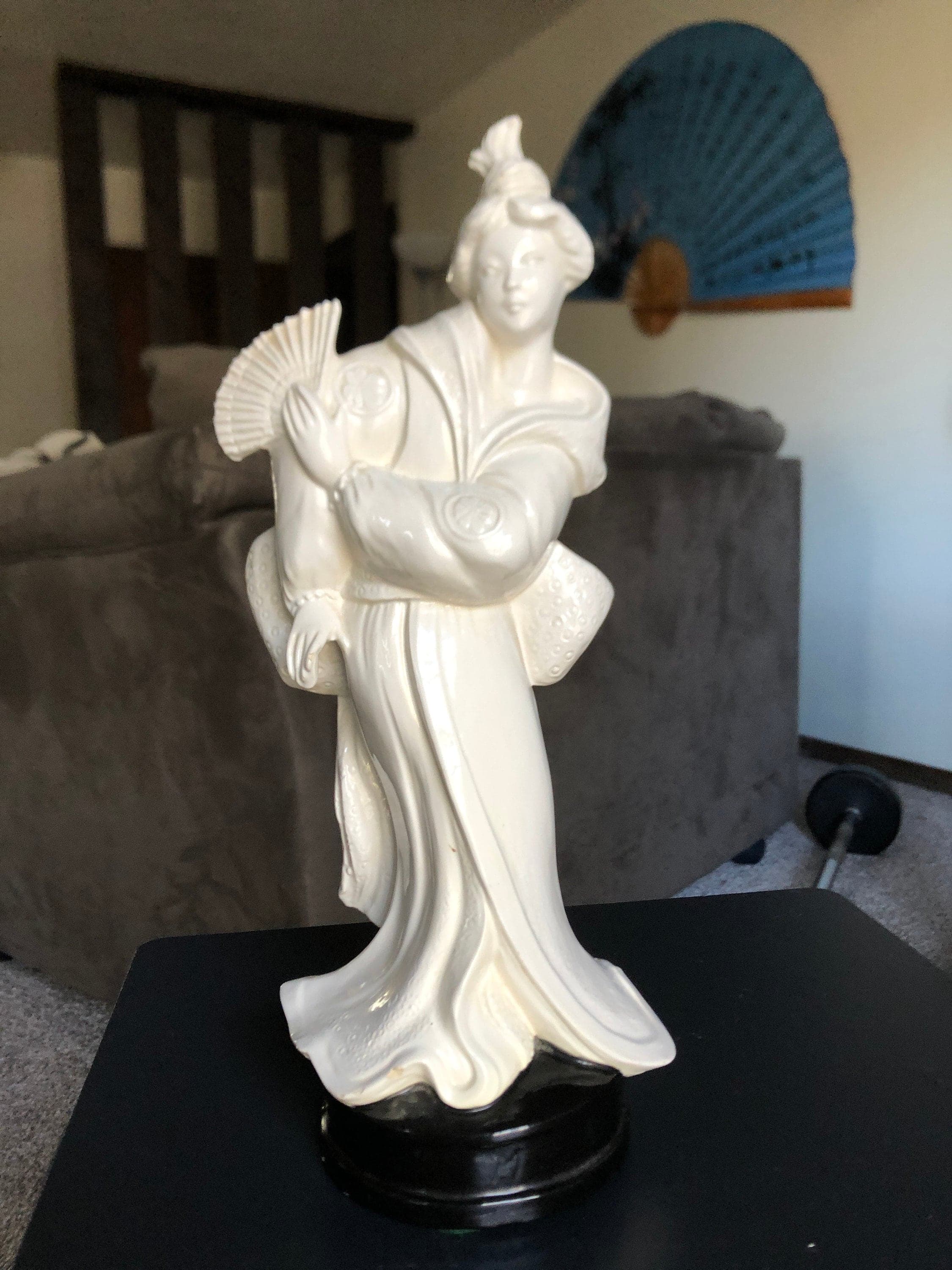 Geisha Person of Art with her folding fan