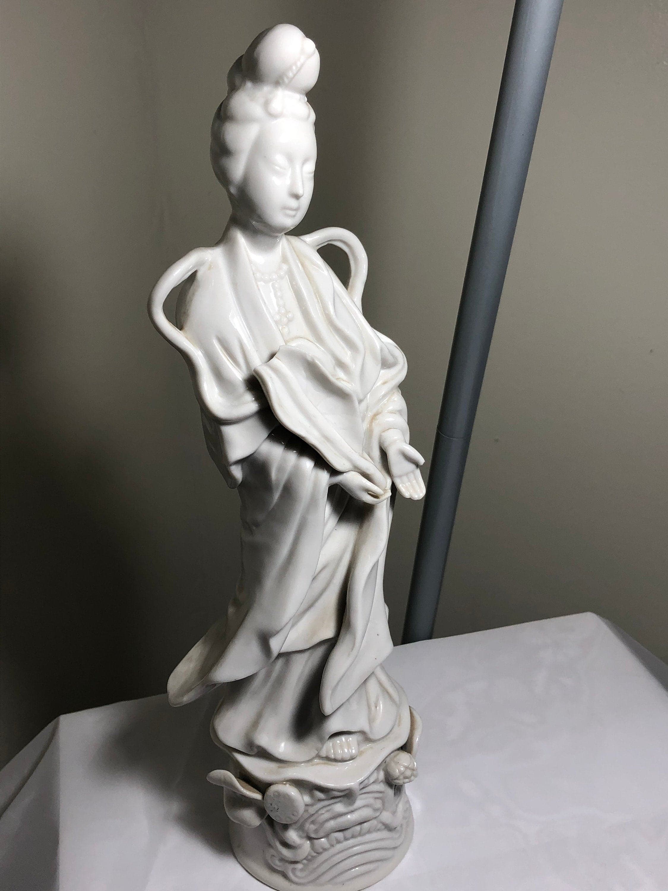 Goddess of Mercy. Hears the cries of the world