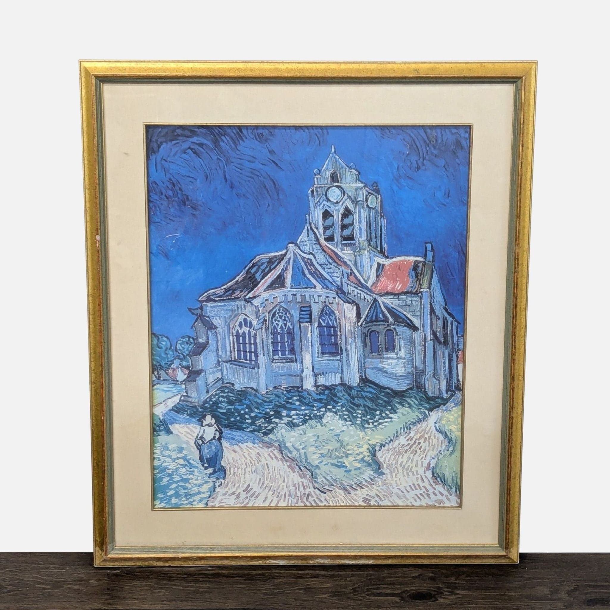 Framed Print of Van Gogh's "The Church at Auvers" with Gold Frame