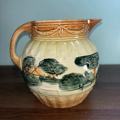 Antique Roseville Yellow ware Woodlands pitcher ca. 1900 glazed farm scene