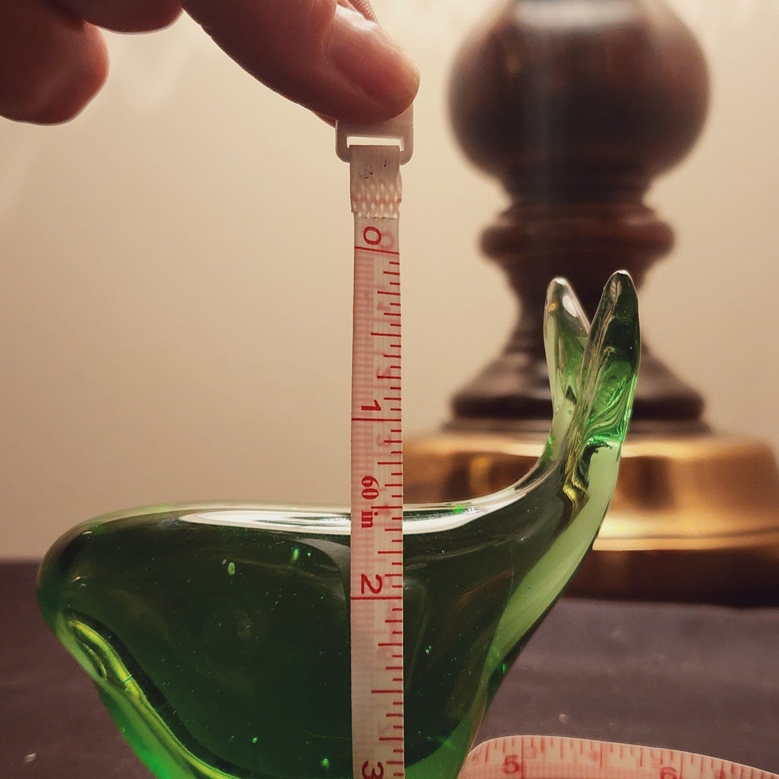 Green glass whale paperweight