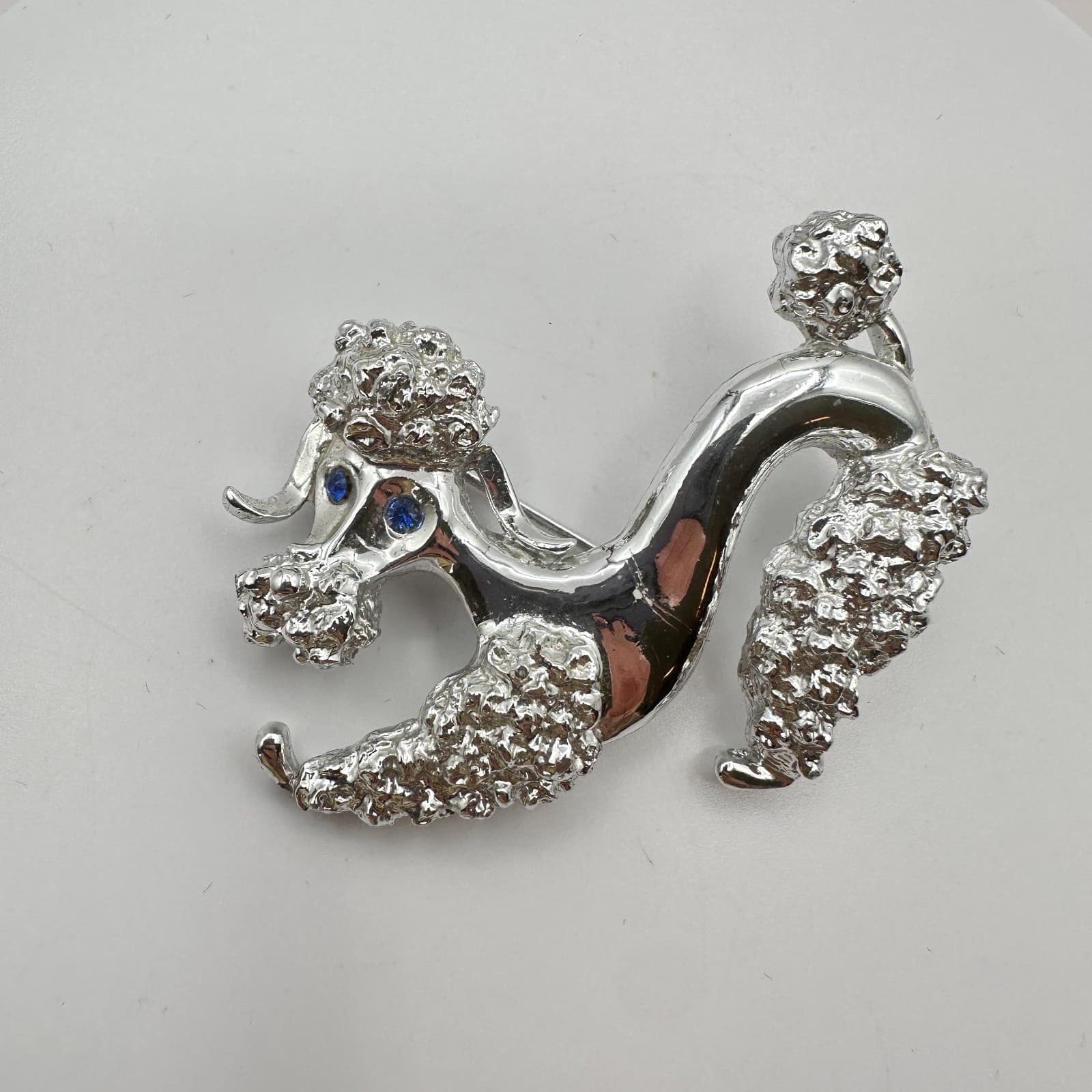 Vintage 60s Mid-Century Silver Tone Poodle Dog Brooch Blue Glass Eyes Textured