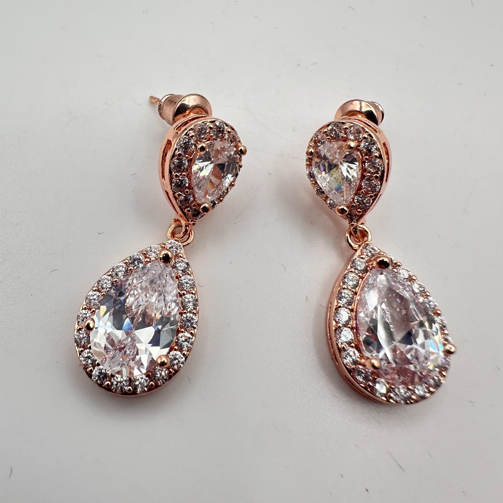 Vintage 90s Rose Gold Tone Pear Cut White Glass Halo Dangle Earrings Jewelry