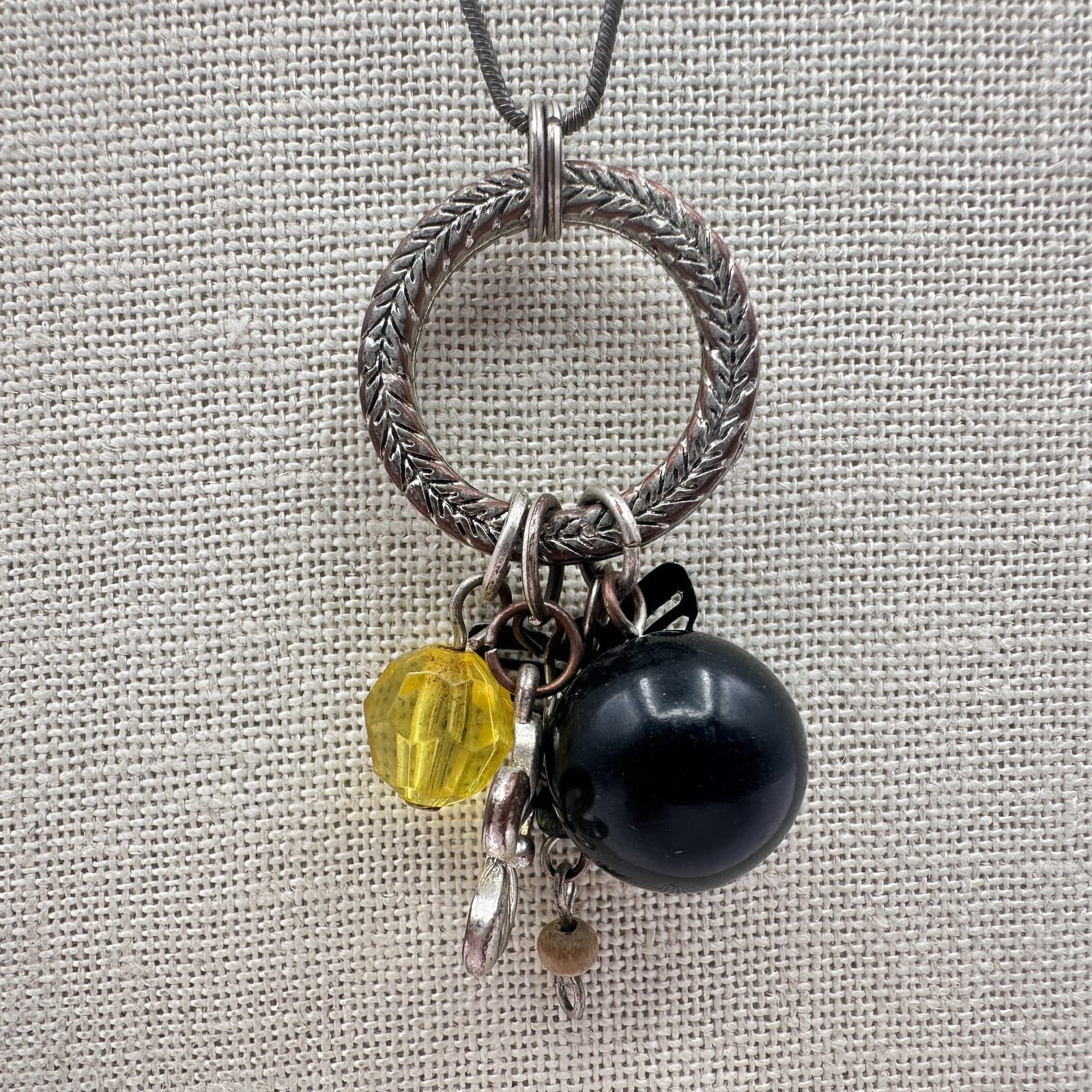 Vintage 60s Necklace Featuring Textured Silver Tone Ring Charm Dangle Jewelry