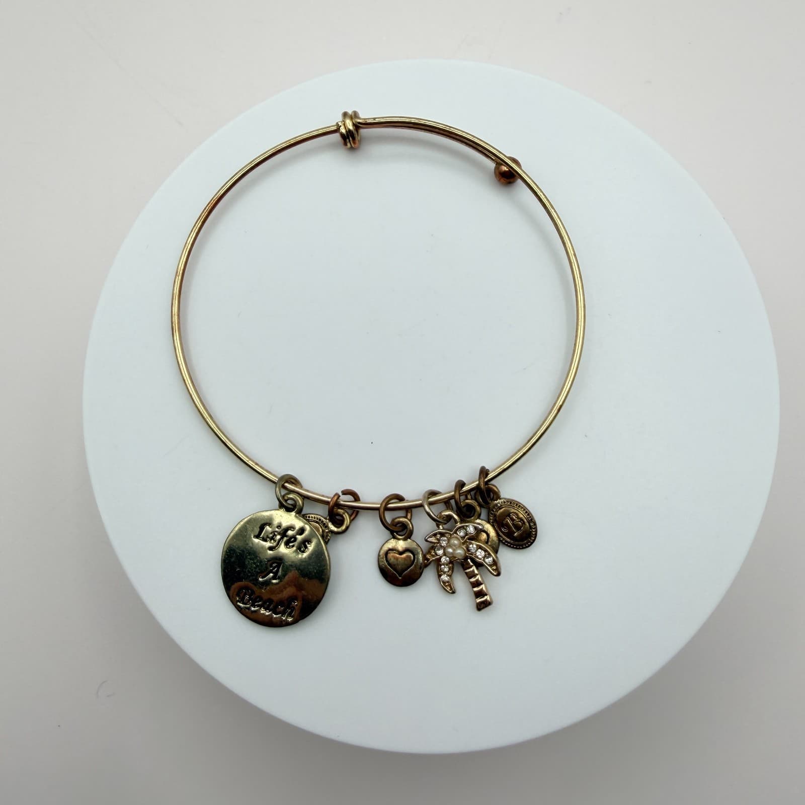 Vintage 90s Gold Tone Bangle Bracelet Palm Tree Heart Life’s A Beach Charm Glass