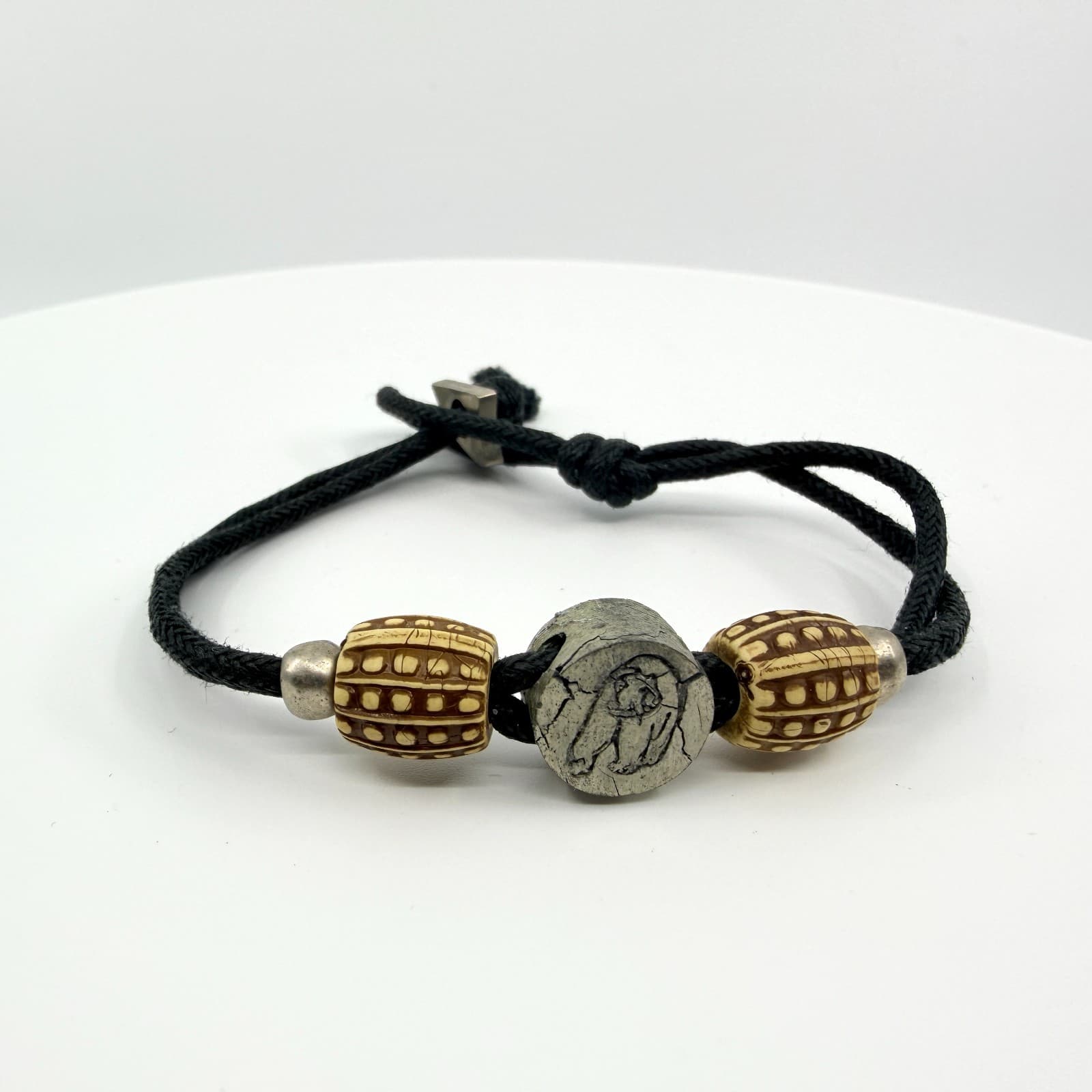 Vintage Tribal Black Cord Bracelet Carved Bear Stone Bead Patterned Beads