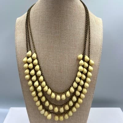 VTG Multi Strand Cream Teardrop Bead Necklace Antique Brass Tone Statement Bib
