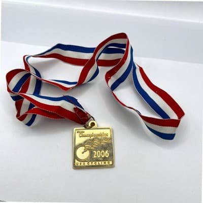 2006 USA Cycling State Championships Medal Gold Tone Winged Wheel Ribbon Trophy