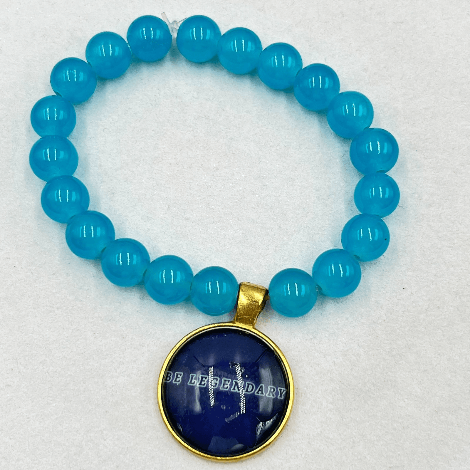 Modern Blue Round Glass Beaded Bracelet Gold Tone "Be Legendary" Charm Retro