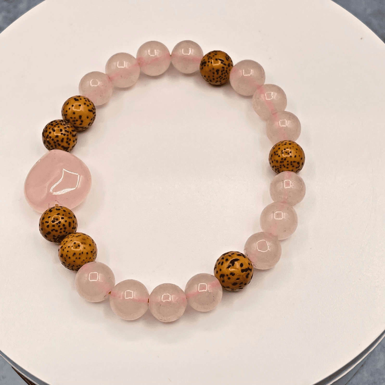 Vintage Style Rose Quartz Herbal Bracelet eaturing rudraksha Seed Seads