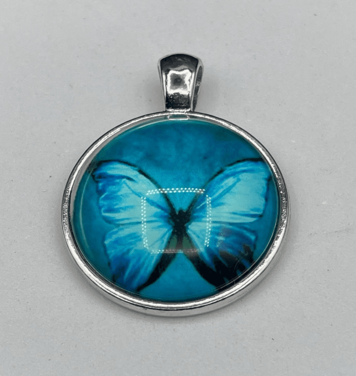 Vintage Clear Blue Cabochon Butterfly Sunburst Radial Pattern Pendant Necklace