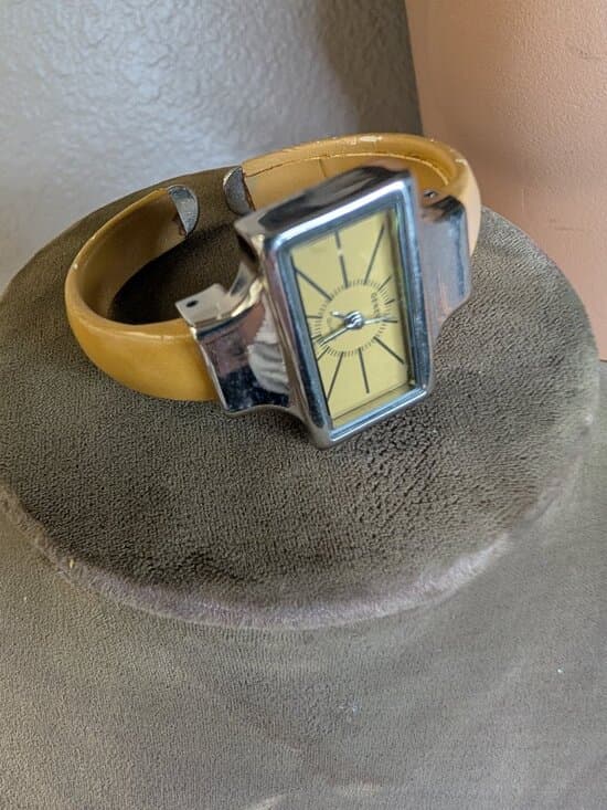 Vintage Geneva Quartz Watch with Yellow Hinged Cuff Rectangular Face