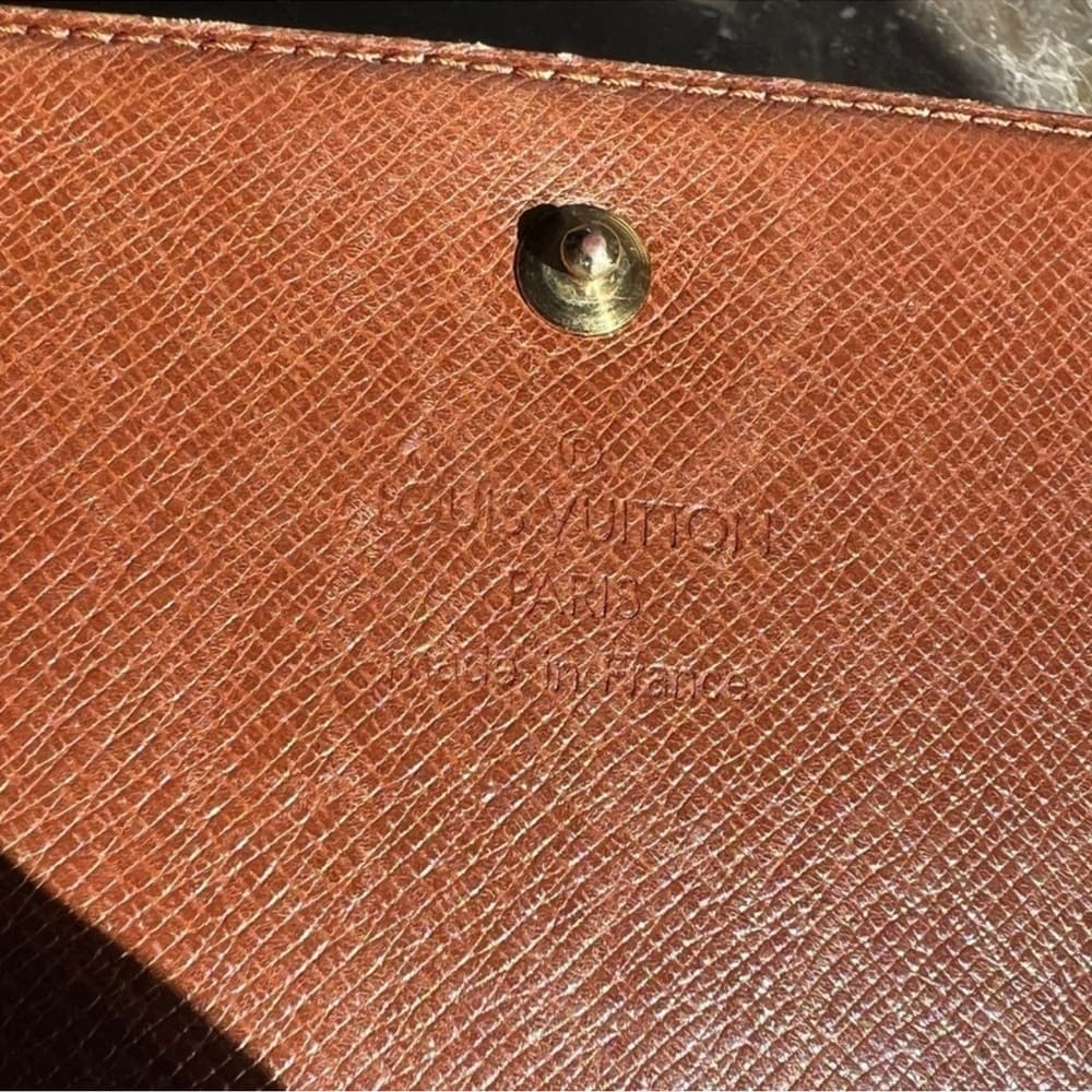Authentic Louis Vuitton Porte Tressor wallet classic monogram canvas