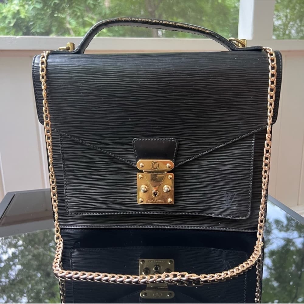 Authentic Louis Vuitton Monceau handbag black gold