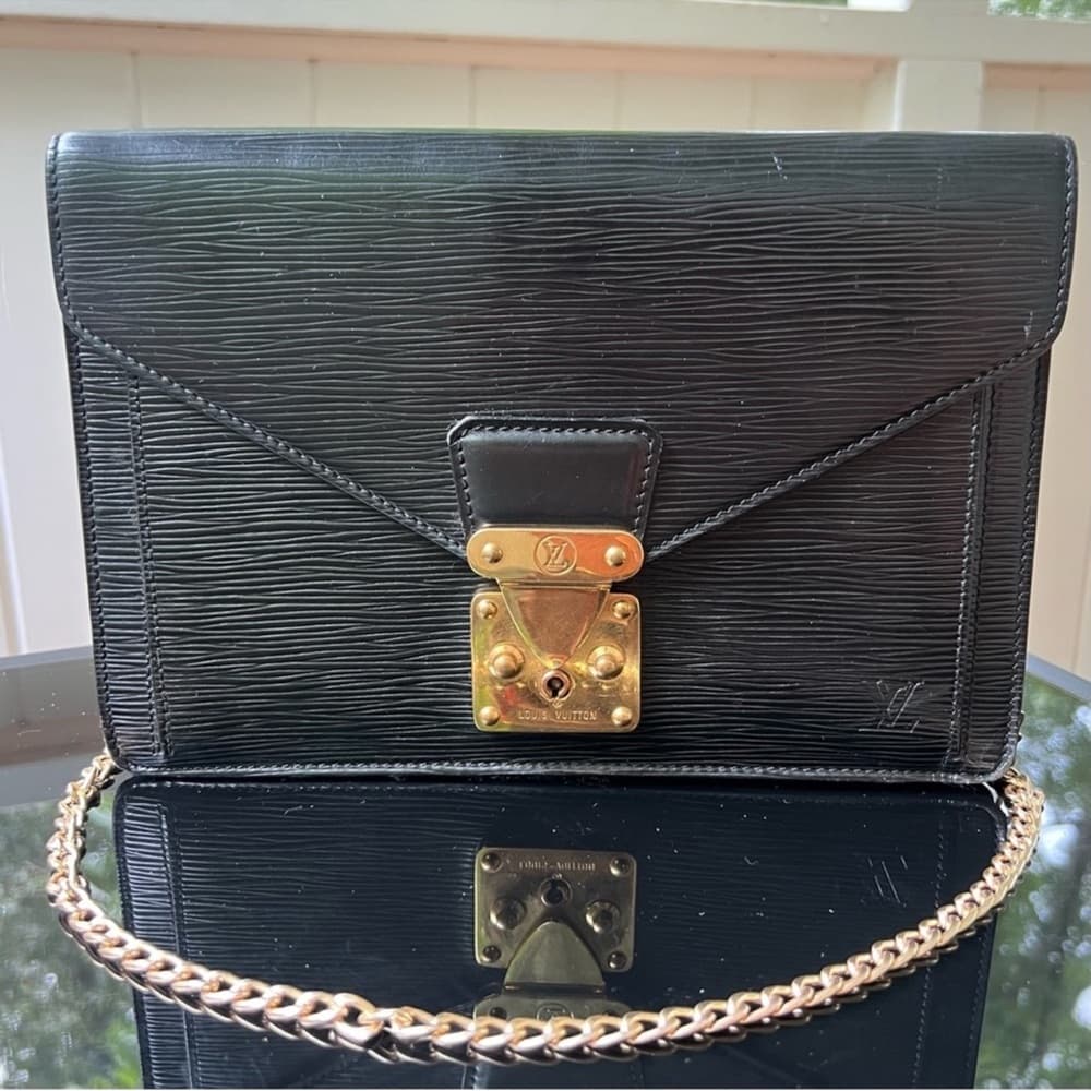 Authentic Louis Vuitton Epi Sellier handbag black gold