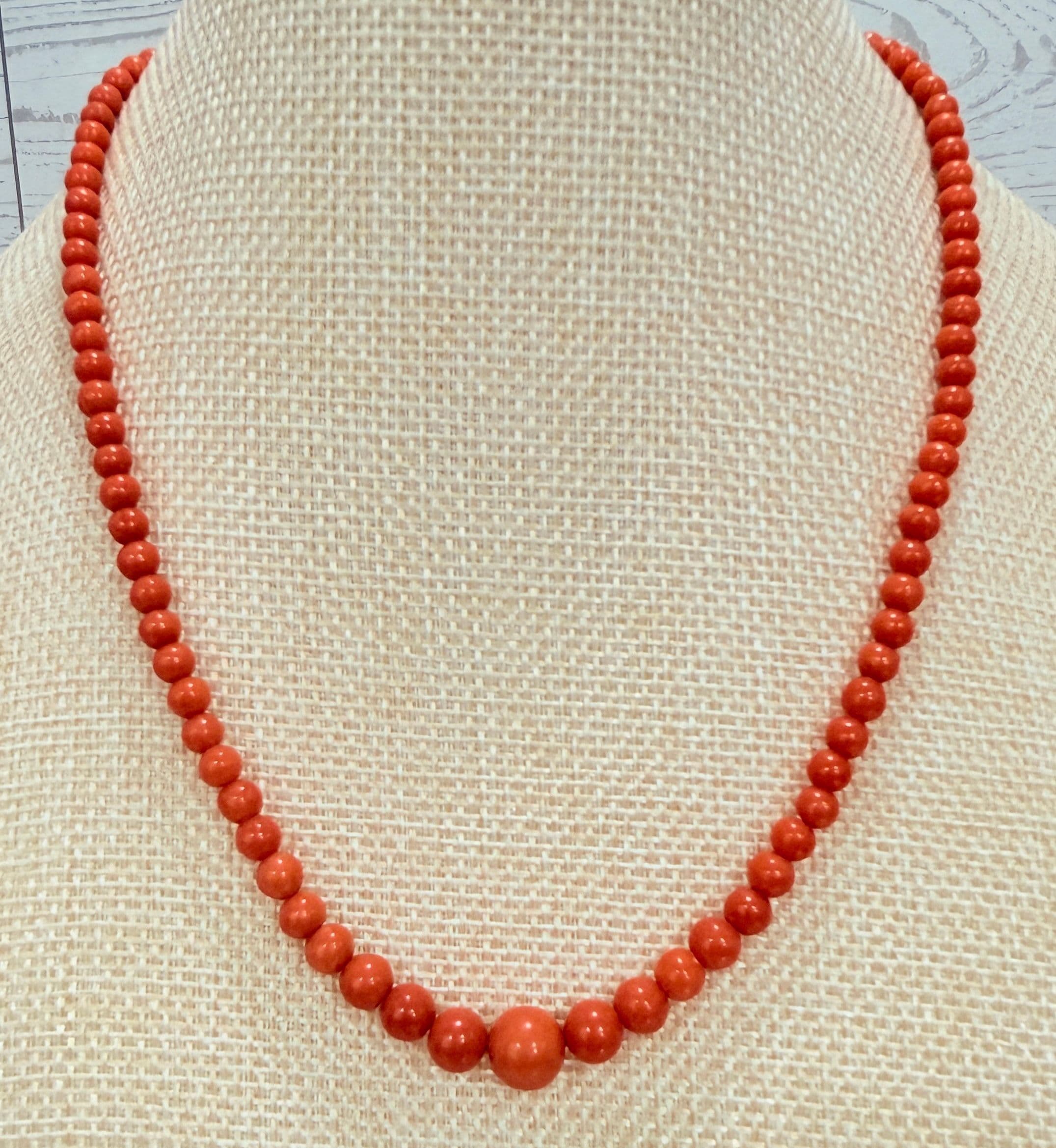 4E. 1900s Polished Orange Coral Bead Necklace