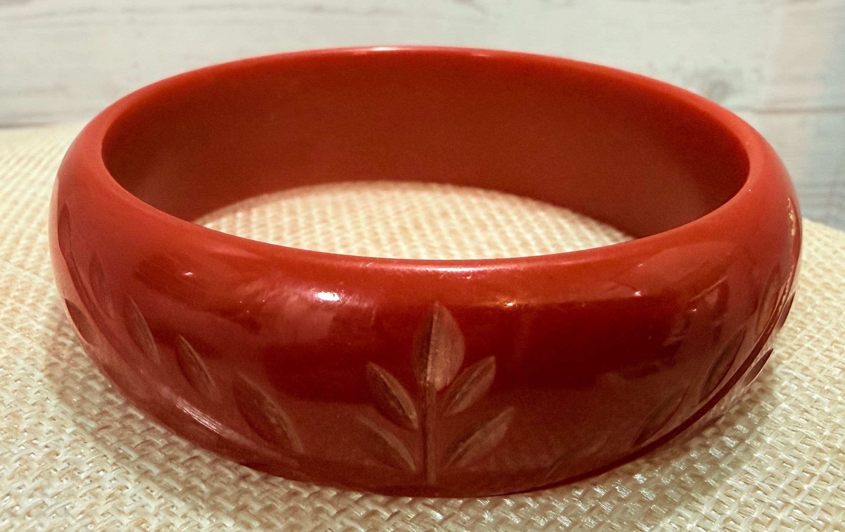 1E. 1940s Carved Cherry Red Floral Bakelite Bangle Bracelet
