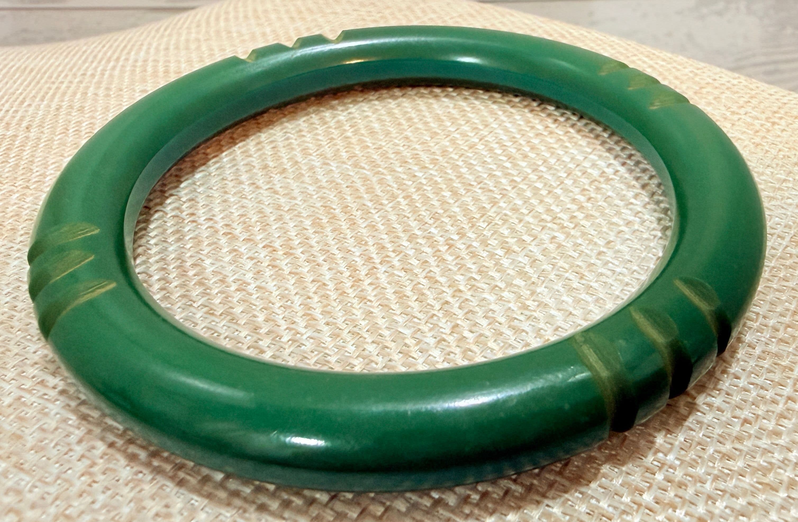 1D. 1940s Carved Spinach Green Bakelite Bangle Bracelet