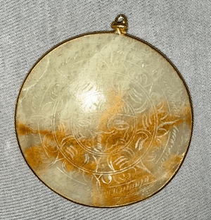 2A3. 1980s Carved White Onyx Mayan Calendar Sun Pendant