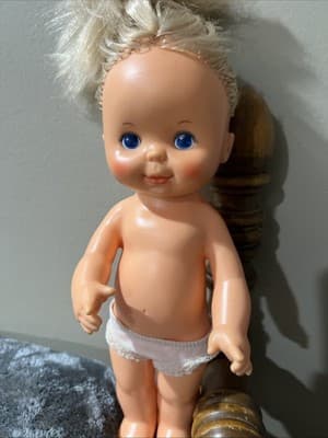 A Vintage Plastic Baby Doll with Blonde Hair and Blue Eyes. Ideal Toy Corp 1980