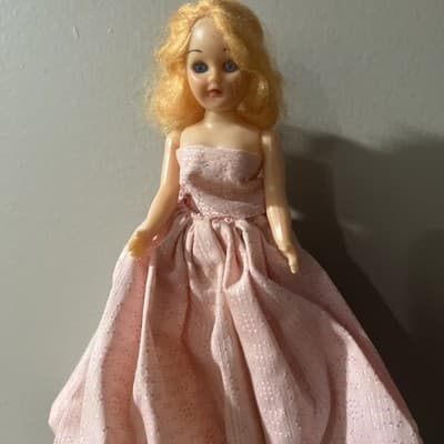 Vintage Hard Plastic Doll with Blonde Hair In A Pink Formal Gown. Needs TLC