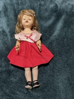 Vintage Composition Doll with Blonde Hair Sleepy Eyes and Red Dress. 19 Inches