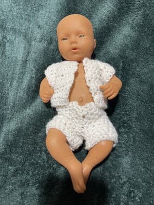 A Berenguer-style Baby Doll with A Knitted Outfit. Great Condition 10 Inches