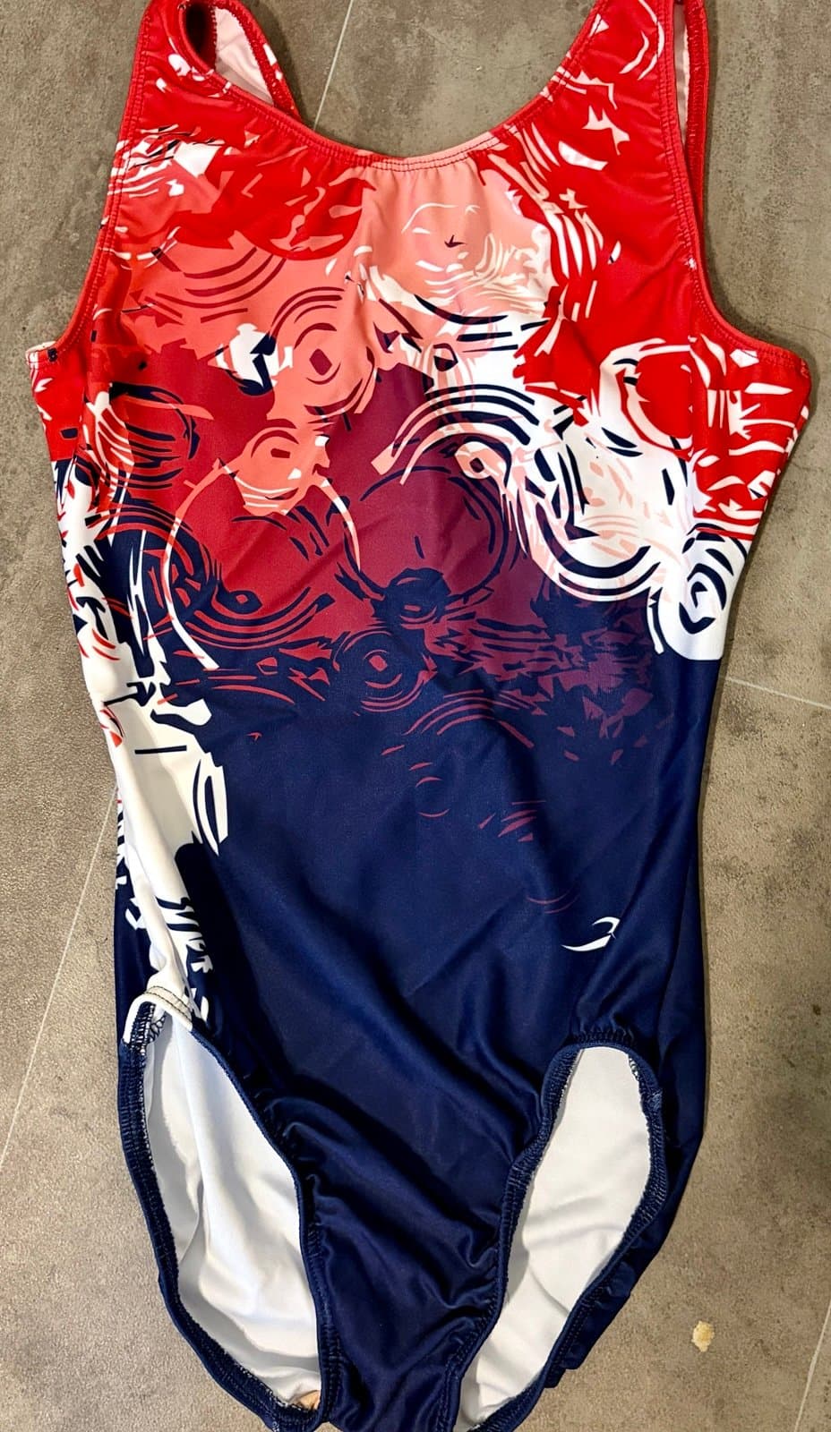 Women’s one piece swimming suit by motion wear s/m.
