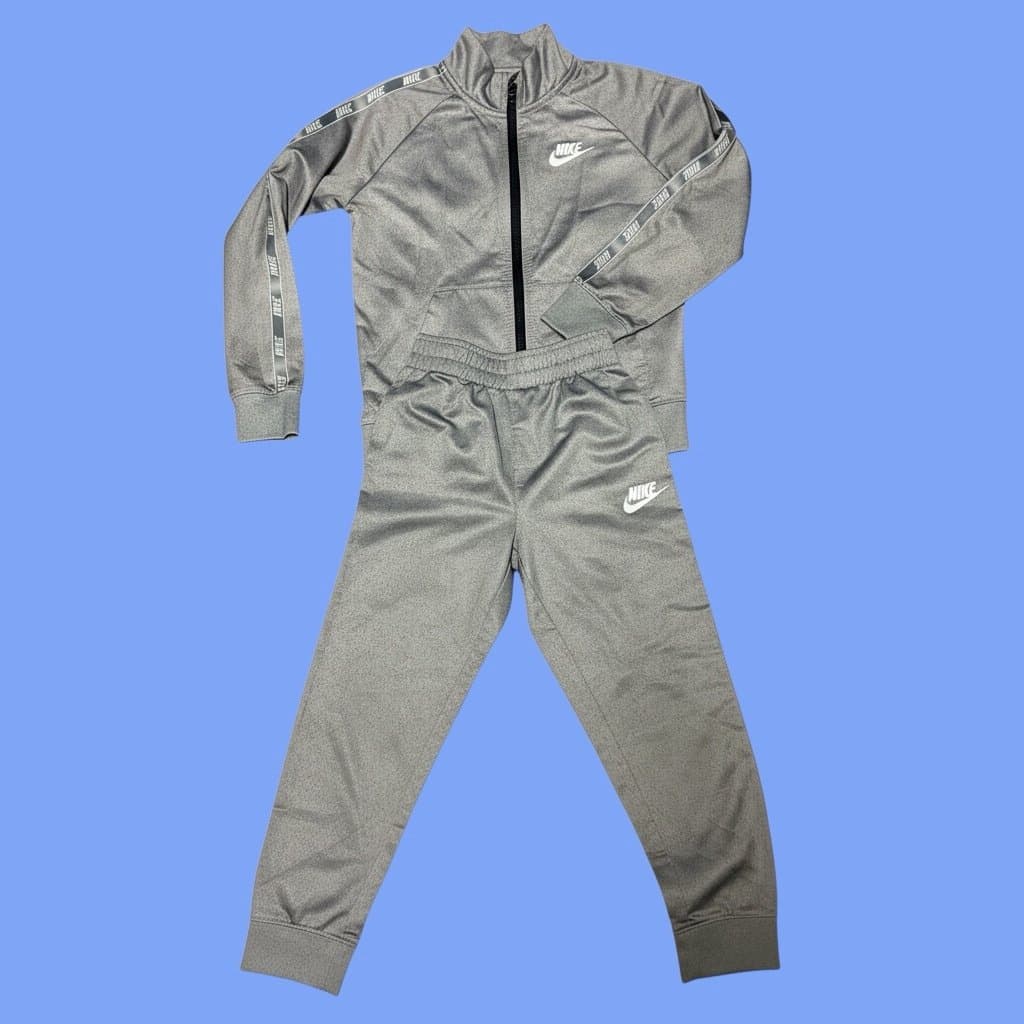 Boys Nike Track Suite size 7