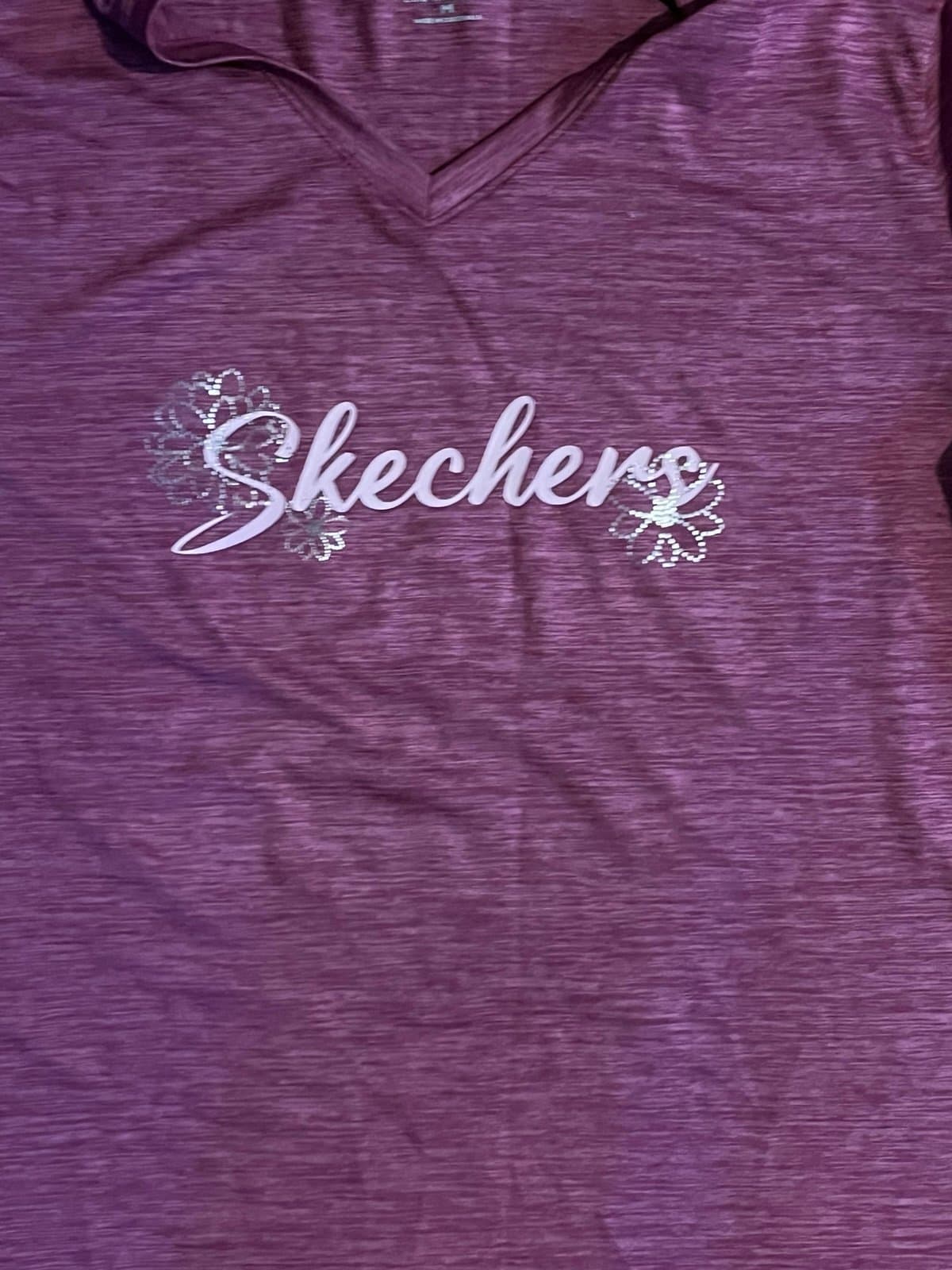 Sketchers shirt size M.
