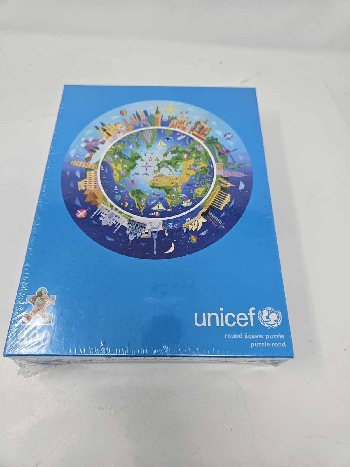 RARE 2009 UNICEF Round 500 Jigsaw Puzzle Around The World By Stephen Waterhouse