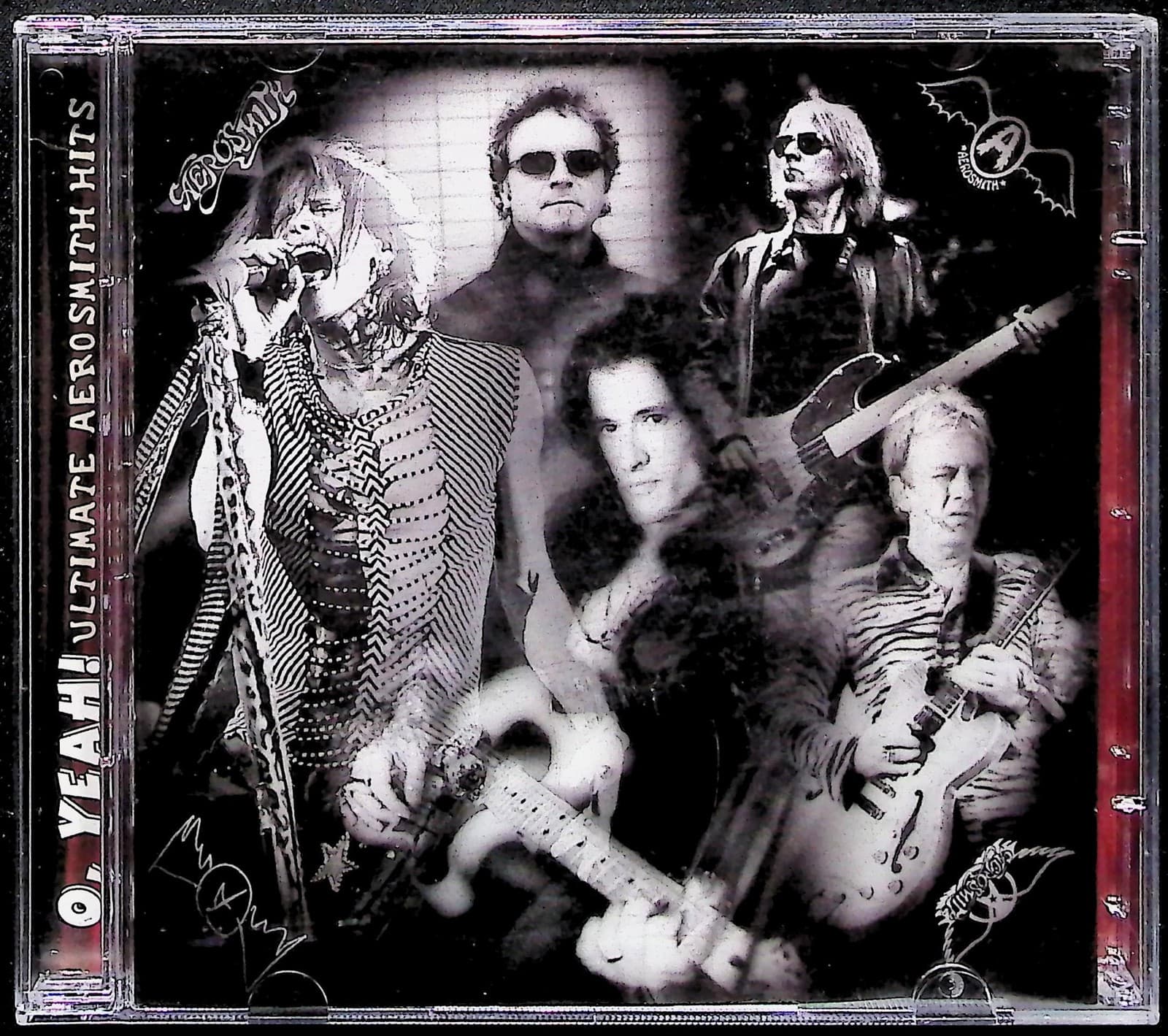 Vintage 2002 Aerosmith CD Eros Greatest Hits Rock Compilation Album Columbia