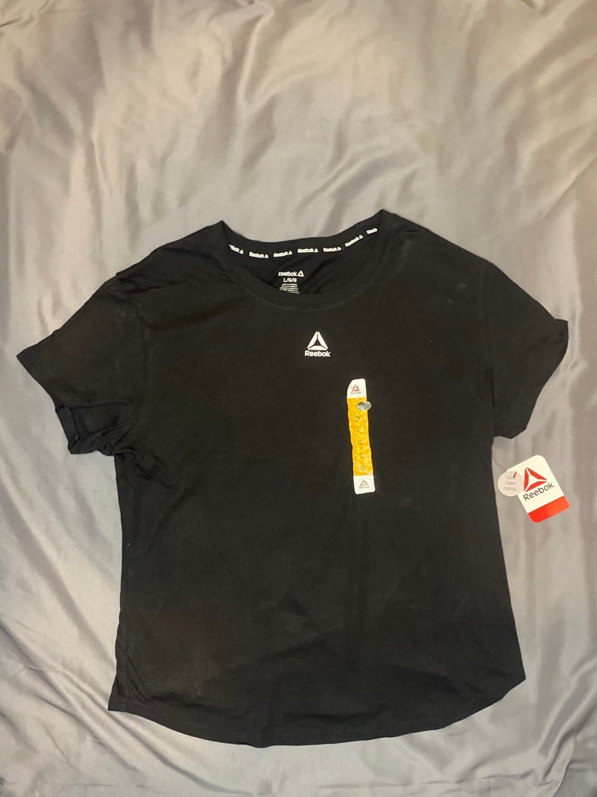 Black Reeboks men’s shirt brand new