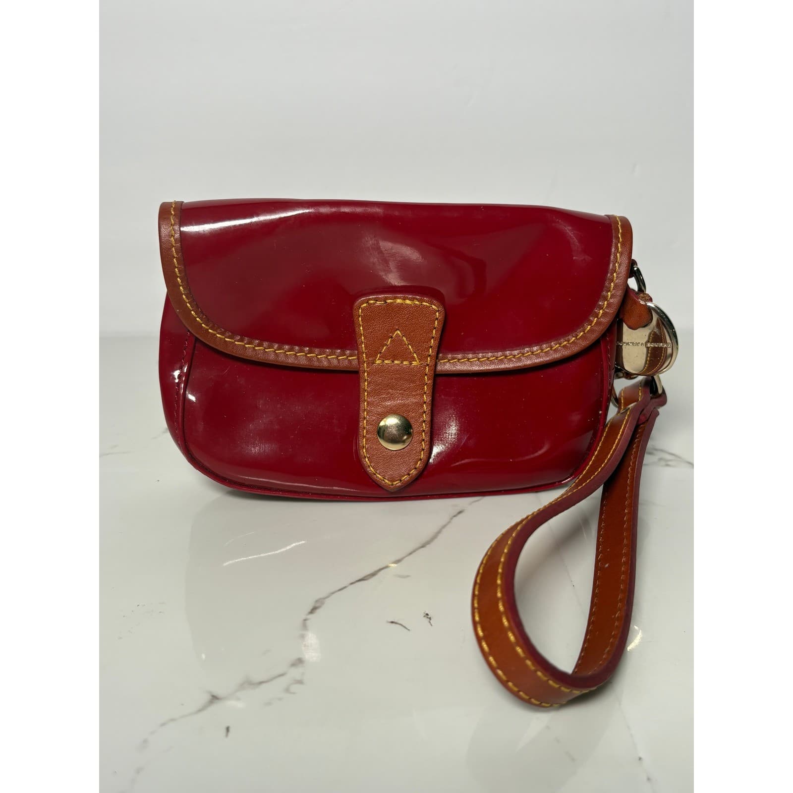 Dooney & Bourke Red Patent Leather Wristlet Tan Trim Duck Charm Clutch Bag