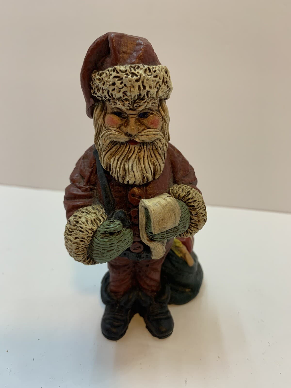 Vintage 5 1/2" Santa Claus Resin Figurine With List And Bag Of Christmas Gifts