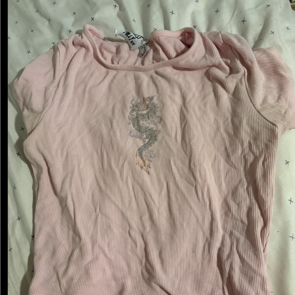 Princess Polly pink cropped tee with dragon design