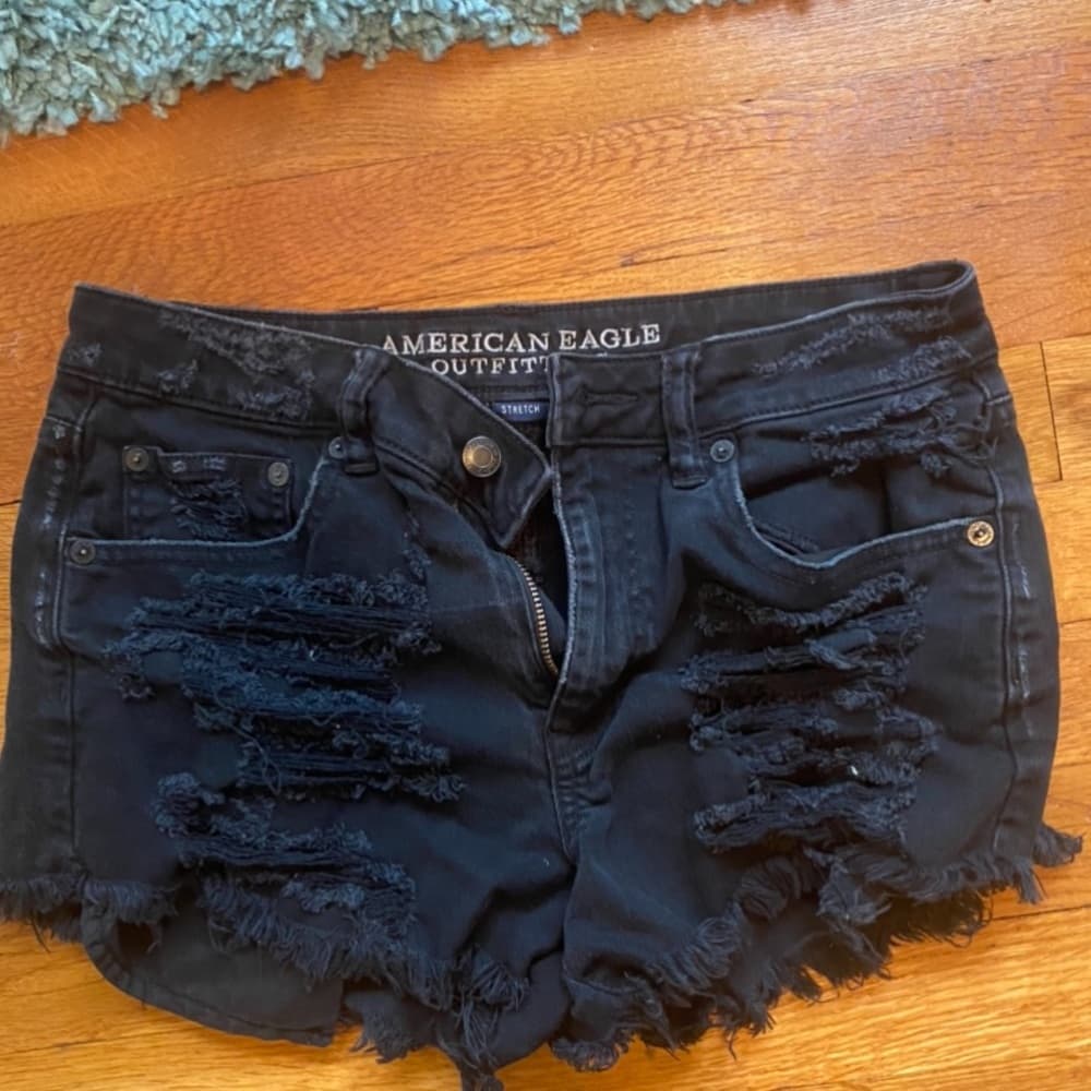 Ripped black jean shorts