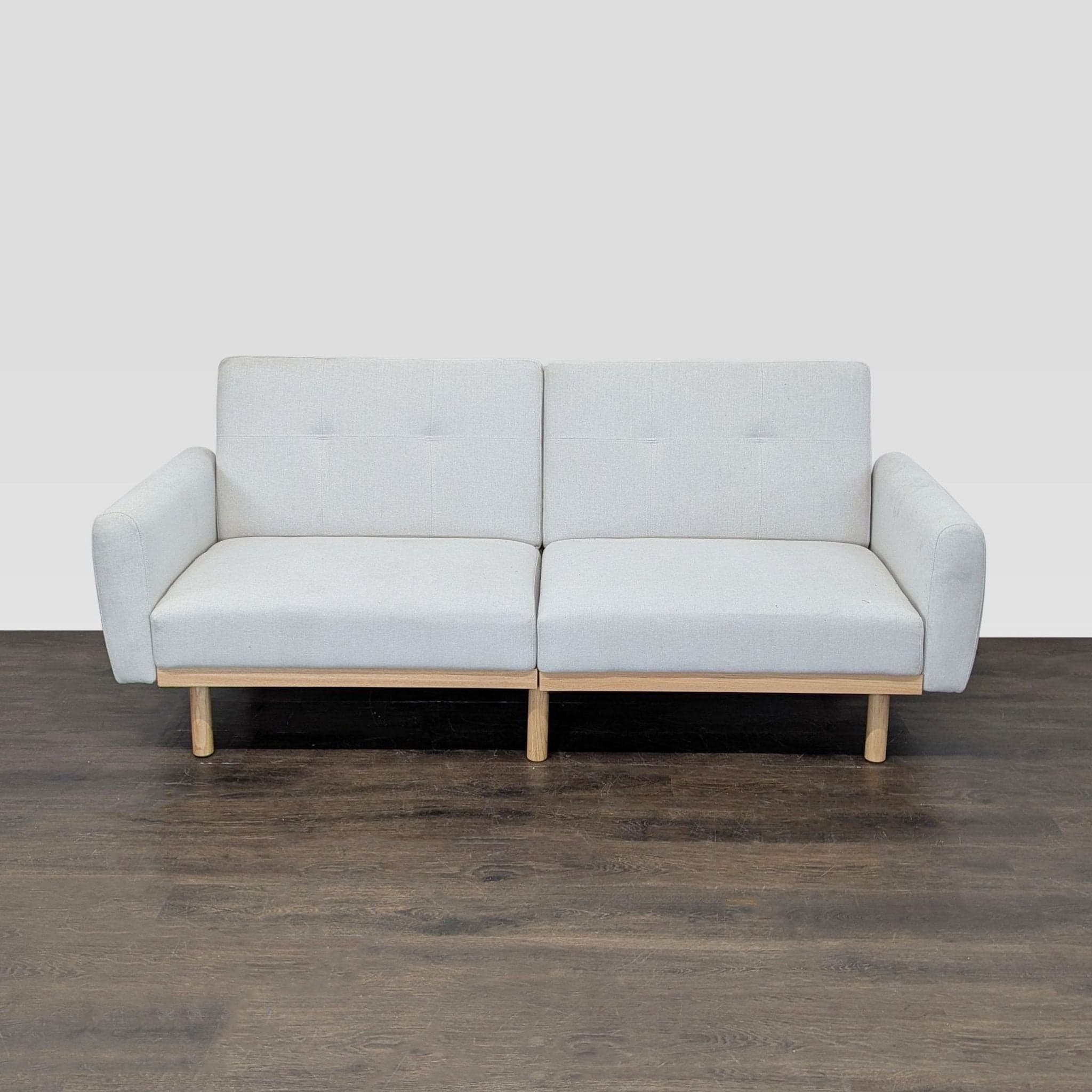 Modern 3-Seat Sofa with Light Wood Base and Cream Upholstery