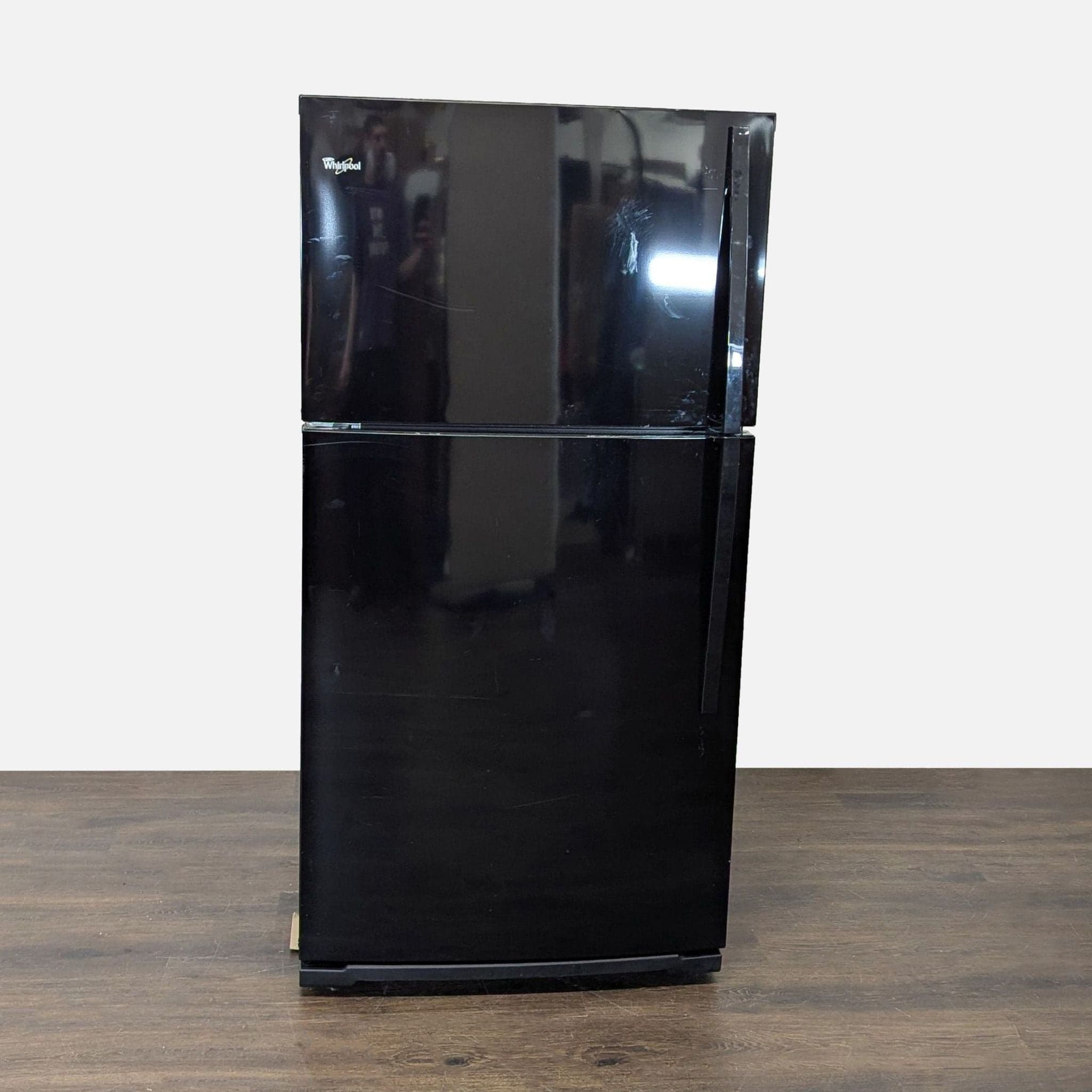 Whirlpool Black Top Freezer Refrigerator - Reliable and Spacious