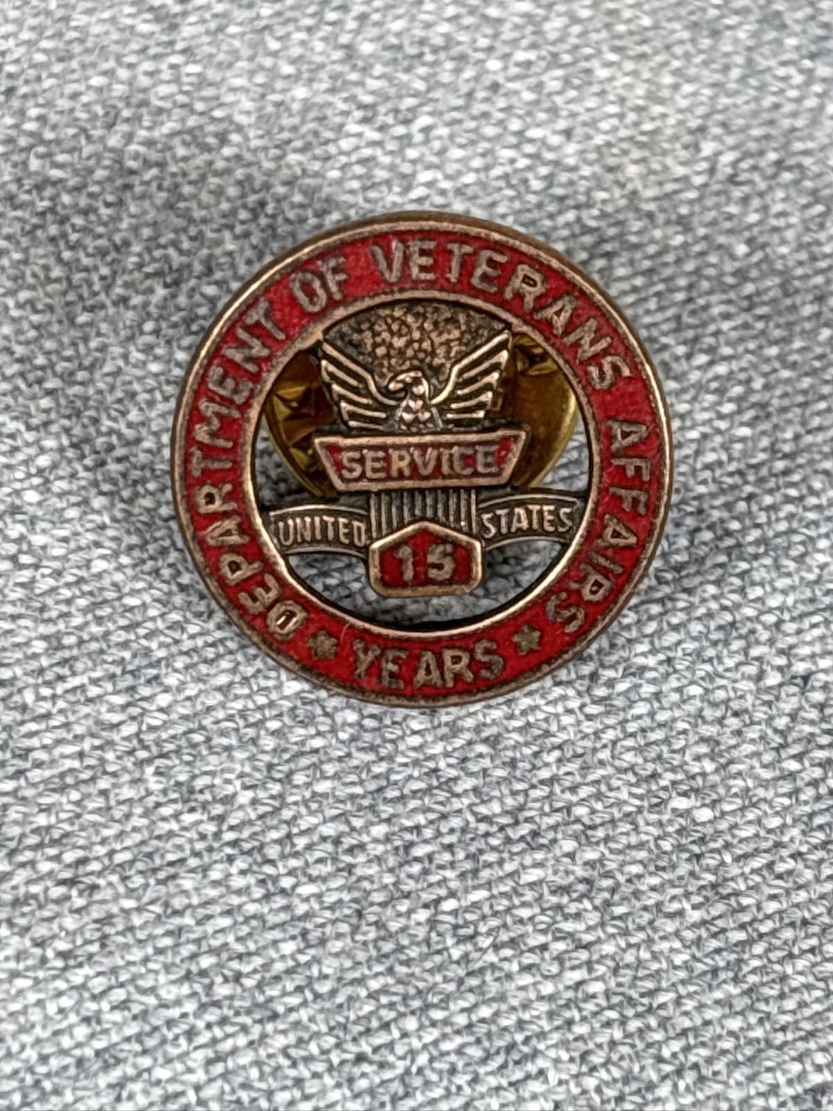 Vintage Department of Veterans Affairs 15 Years Service Lapel Pin VA Red