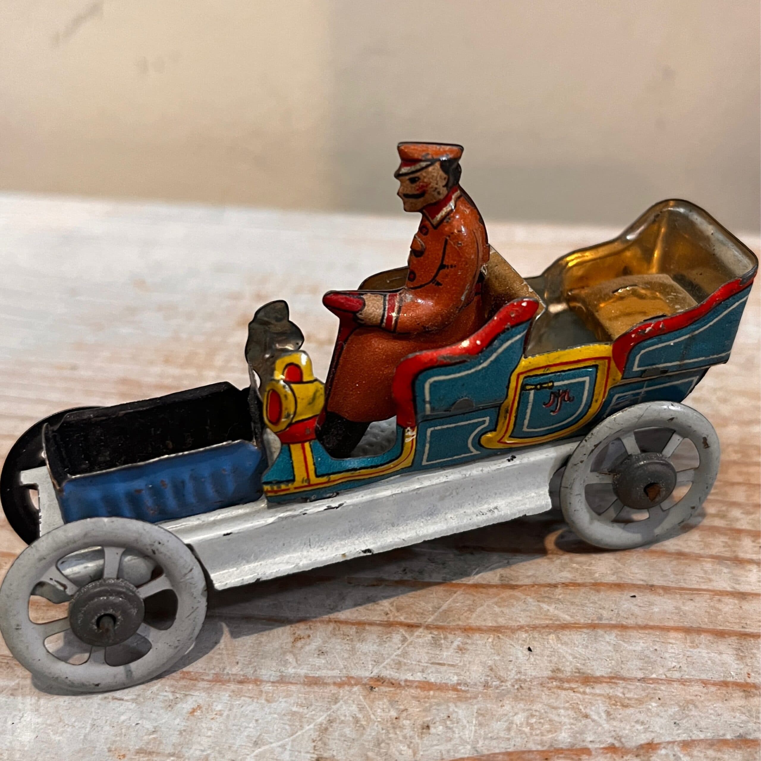 Chauffer Penny Dime Tin Toy - Regular