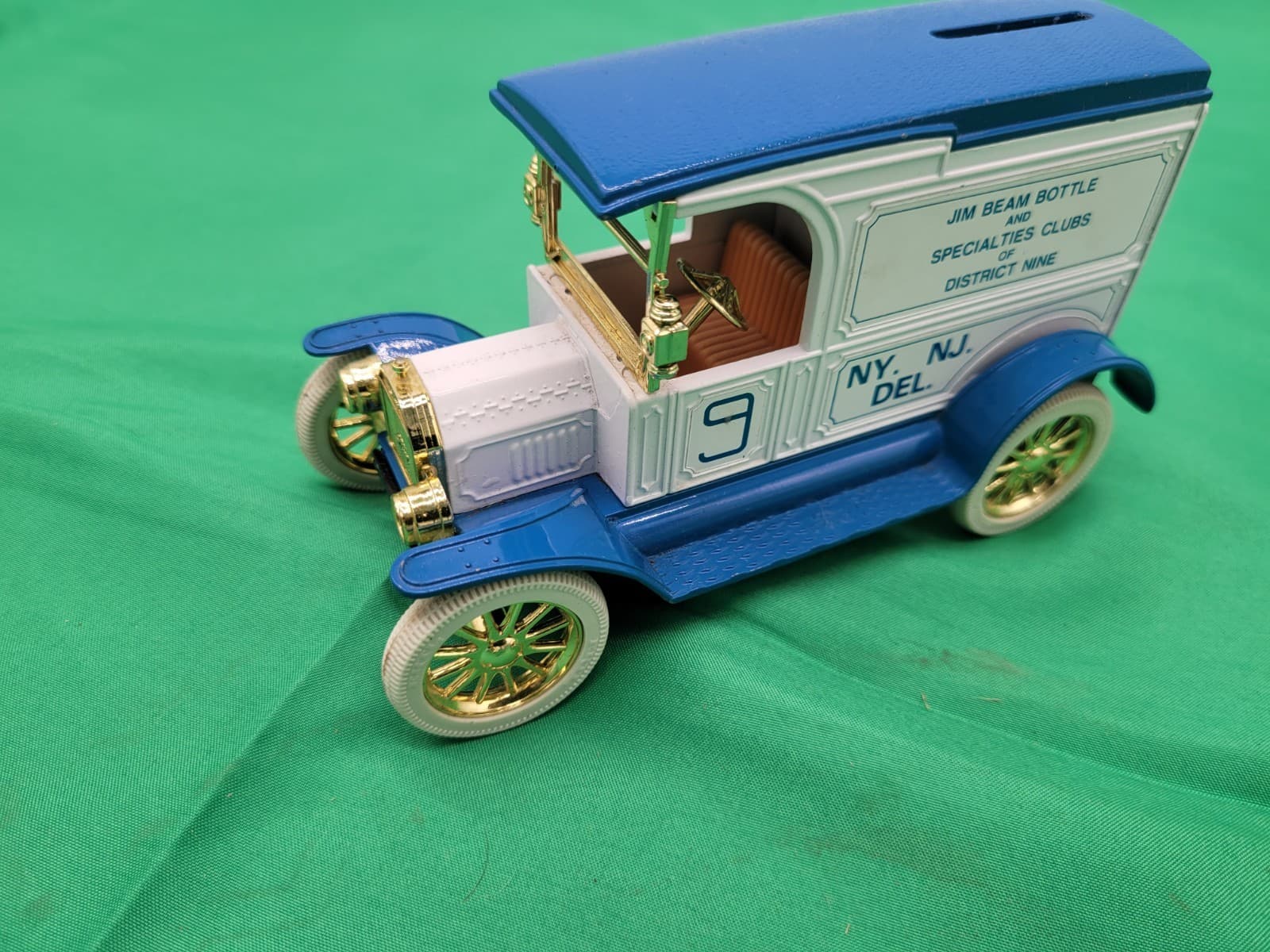 Vintage Jim Beam Bottle Club District Nine Delivery Truck Coin Bank Blue White