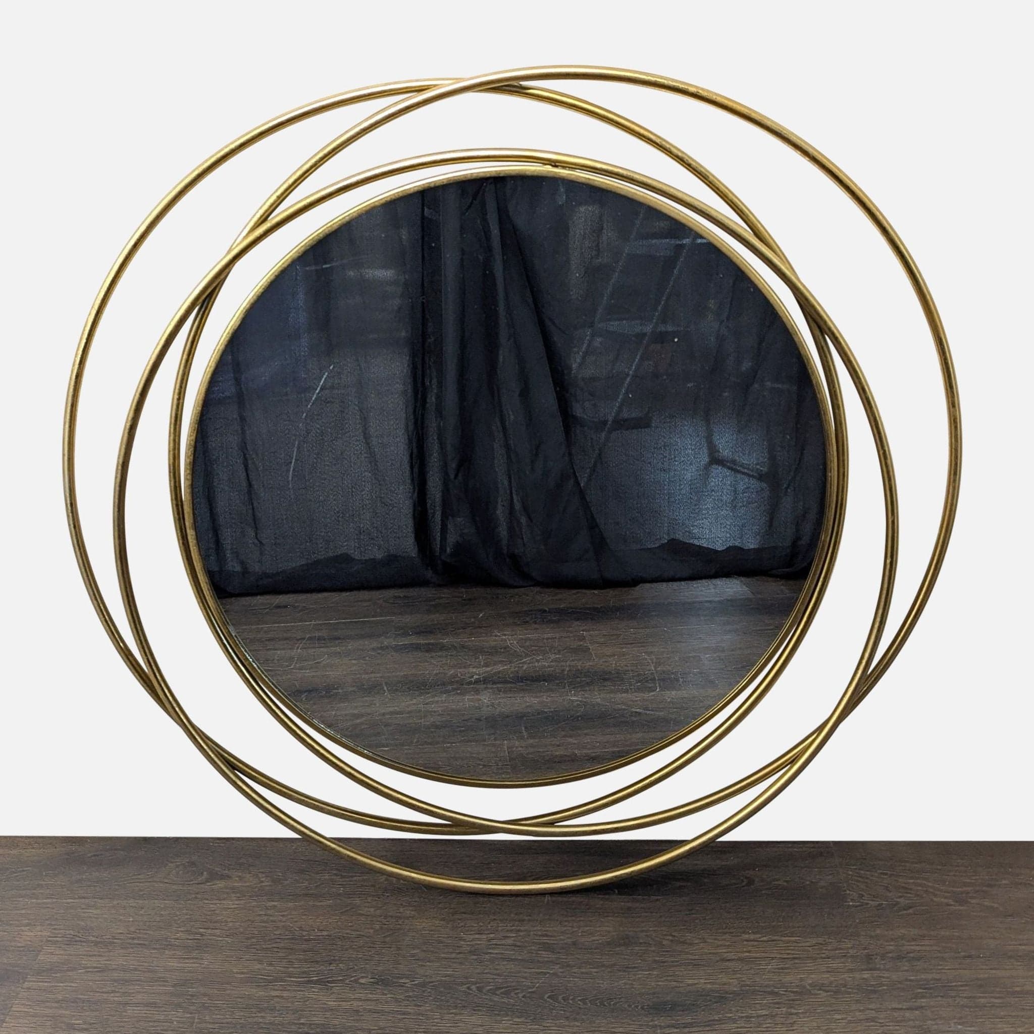 UMA Gold Metal Room Wall Mirror with Overlapping Circles