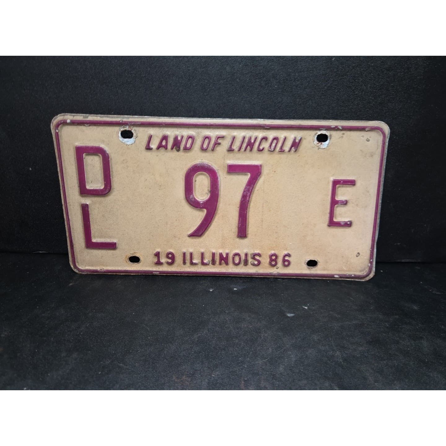 Illinois License Plate DL 97 E, Land of Lincoln, Maroon Cream Metal Vintage 1986